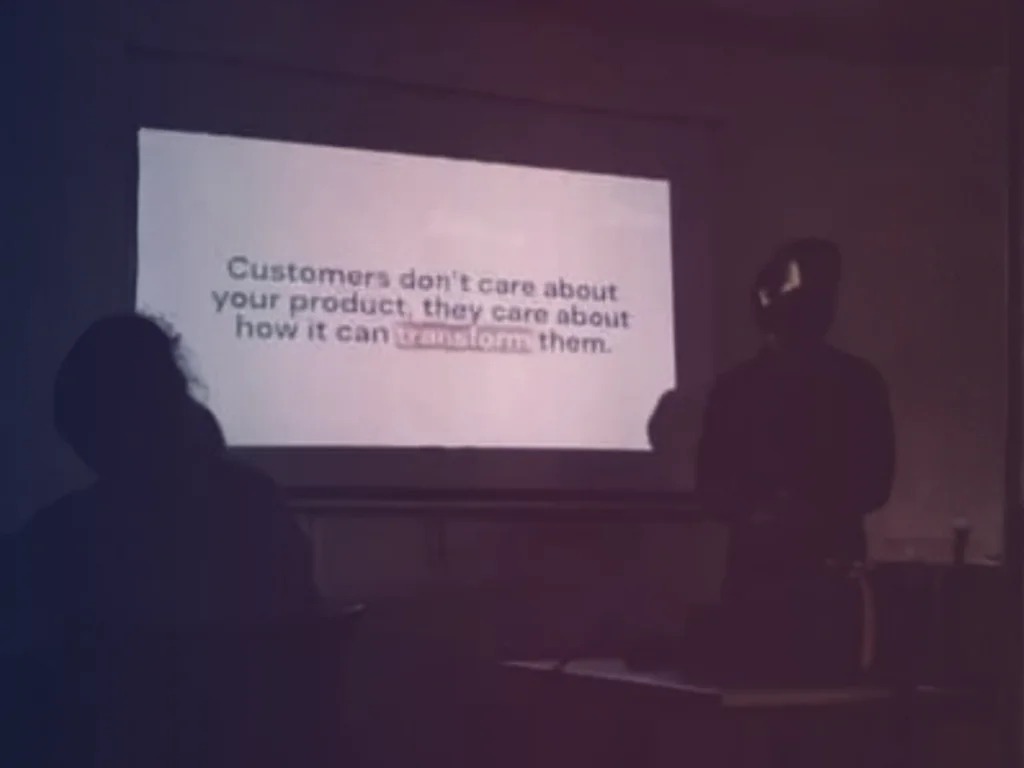 Rey presenting growth strategy to an audience